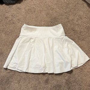 Halara golf/tennis skirt with built-in shorts, never worn, XS, smoke free home